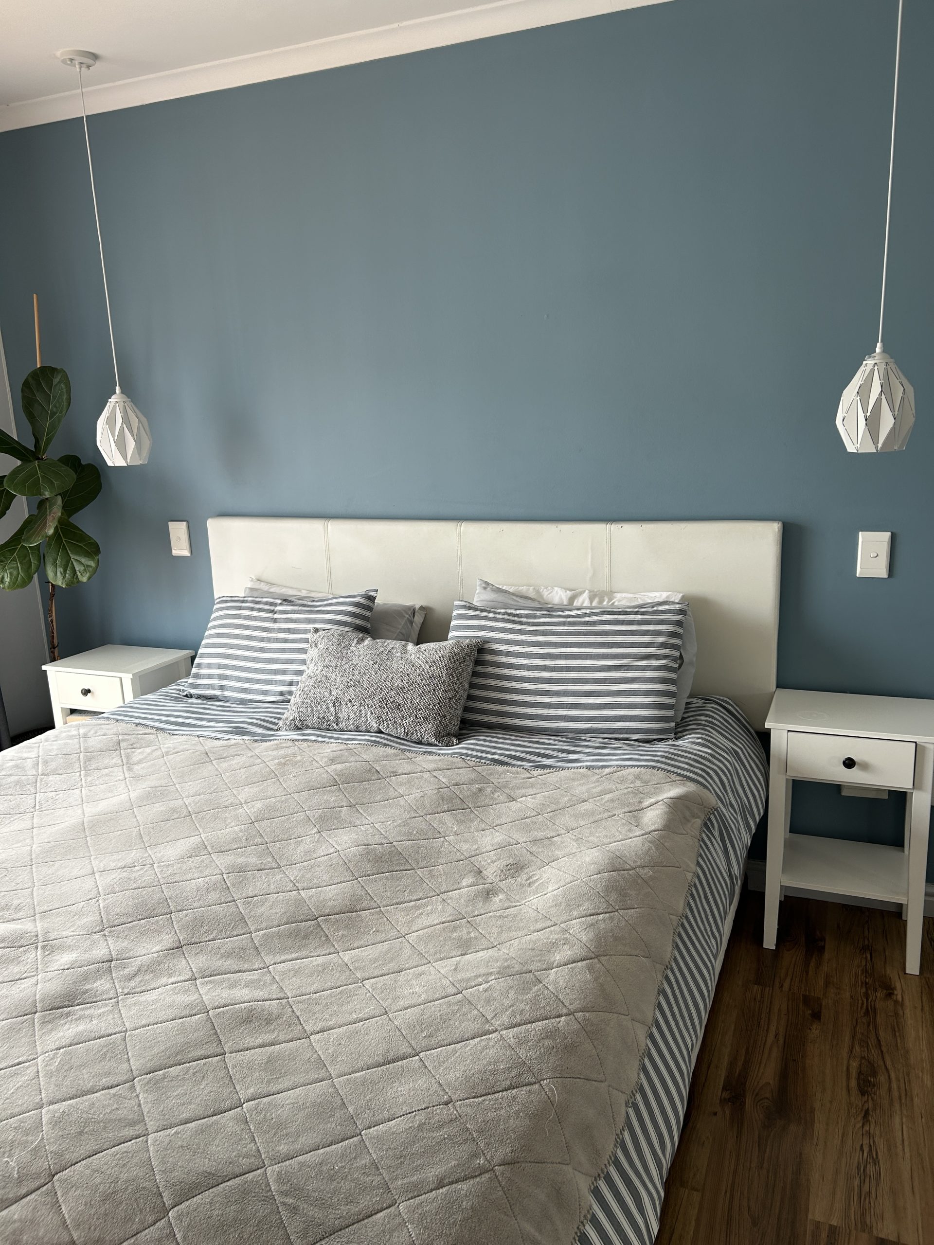 Blue bedroom feature wall painted by MJK Solutions