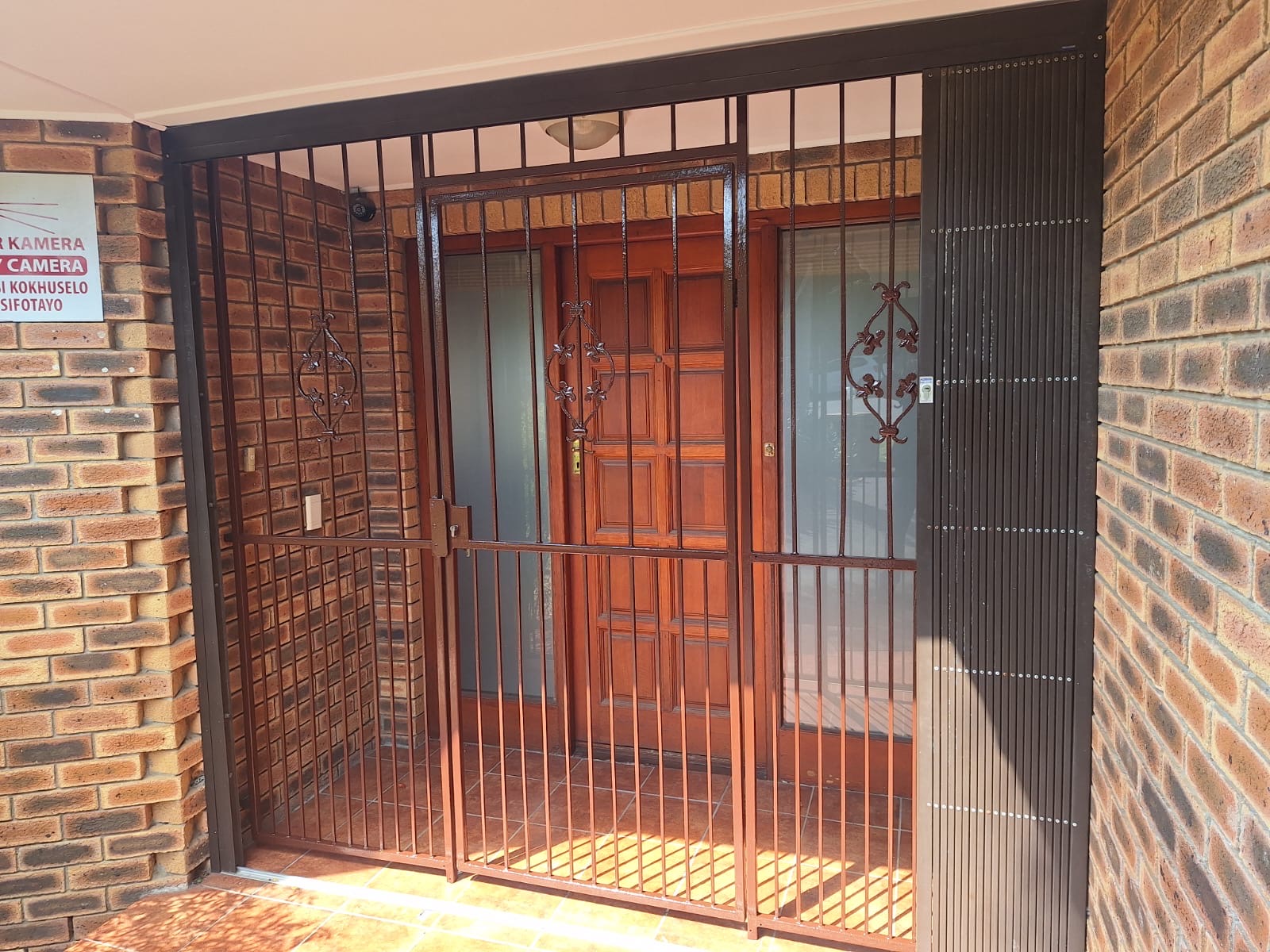 Exterior entrance finishing completed by MJK Painting Solutions in Durbanville