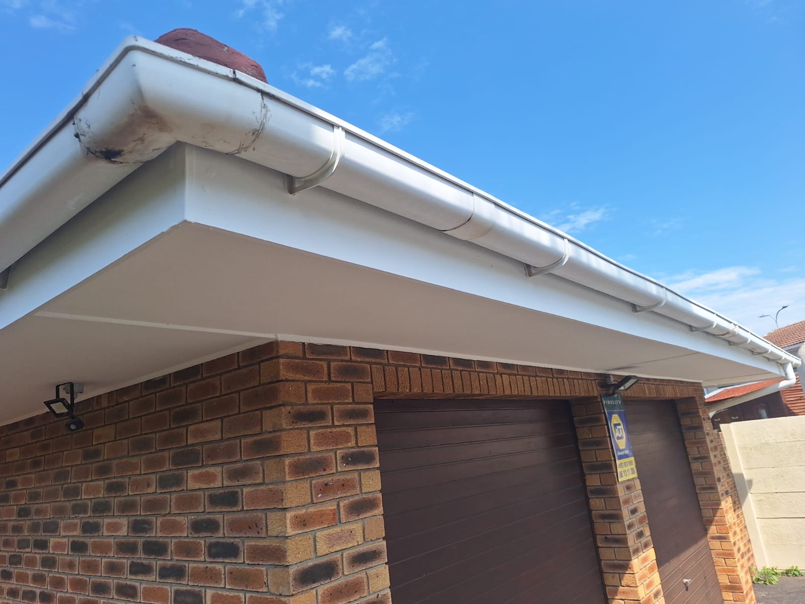 Freshly painted fascia boards and exterior trim on a Durbanville home